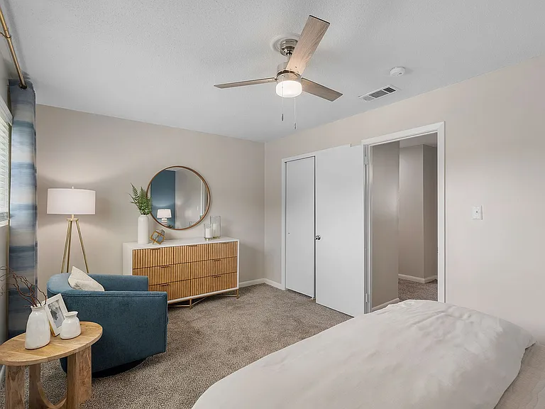 Bedroom with carpet & ceiling fan