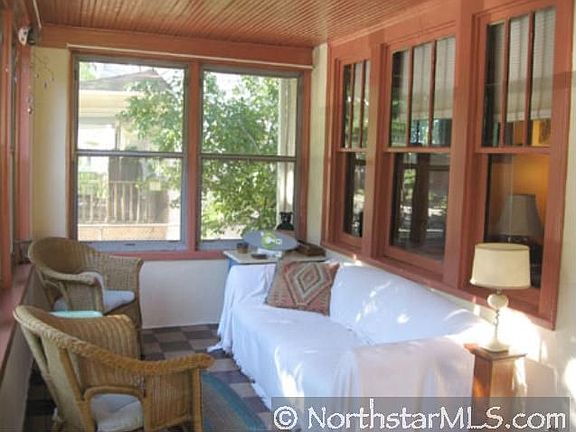 A sunny 3-season porch creates a welcoming entry!