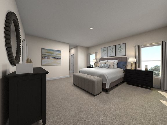 Residence 4 primary suite staged at a nearby Meritage community.