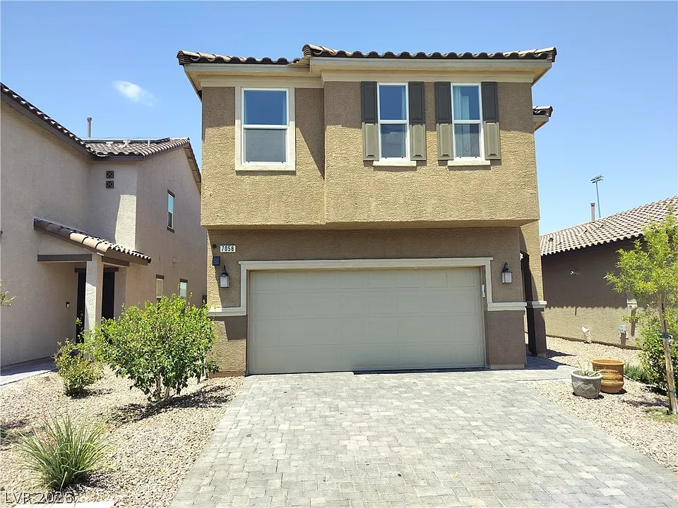 7058 Baza Ave