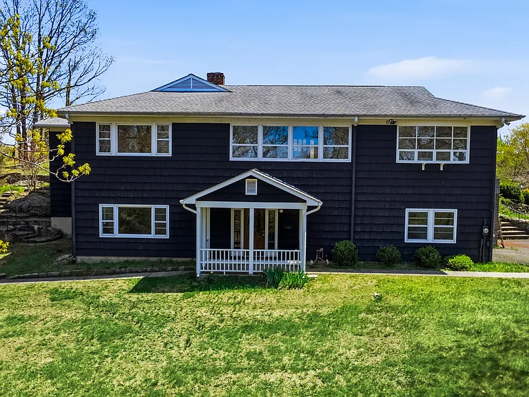 Tucked at the end of a quiet cul-de-sac, this exceptional estate offers rare privacy on more than 3 picturesque acres.