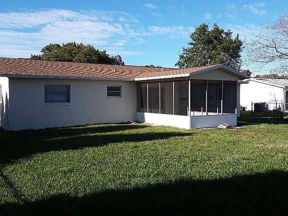 back of house with screen ro