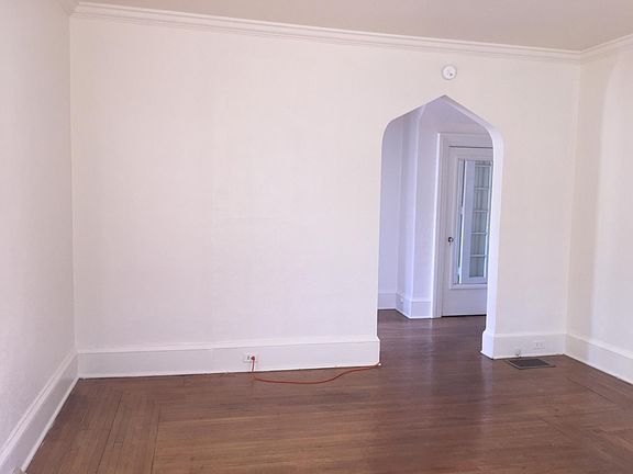 Living room with view to entry way