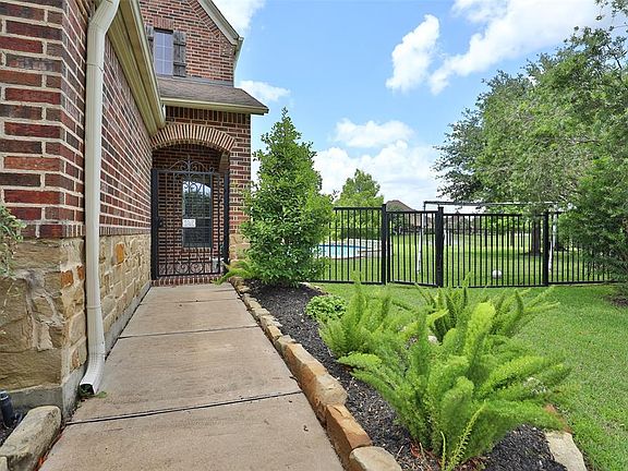 Huge lot with pool and lakeside view.