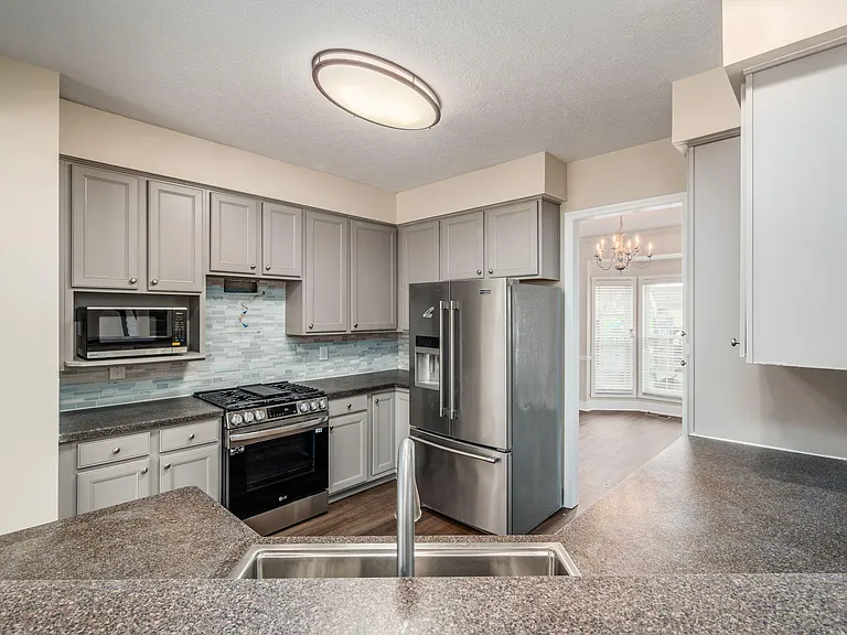 7302 Claddaugh Ln — Photo 15