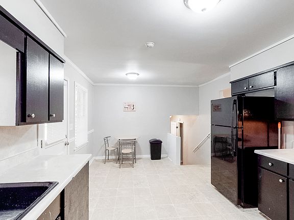 The kitchen is next to dining area.