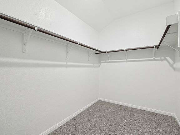There apos s plenty of room for clothes and storage in the primary bedroom closet.