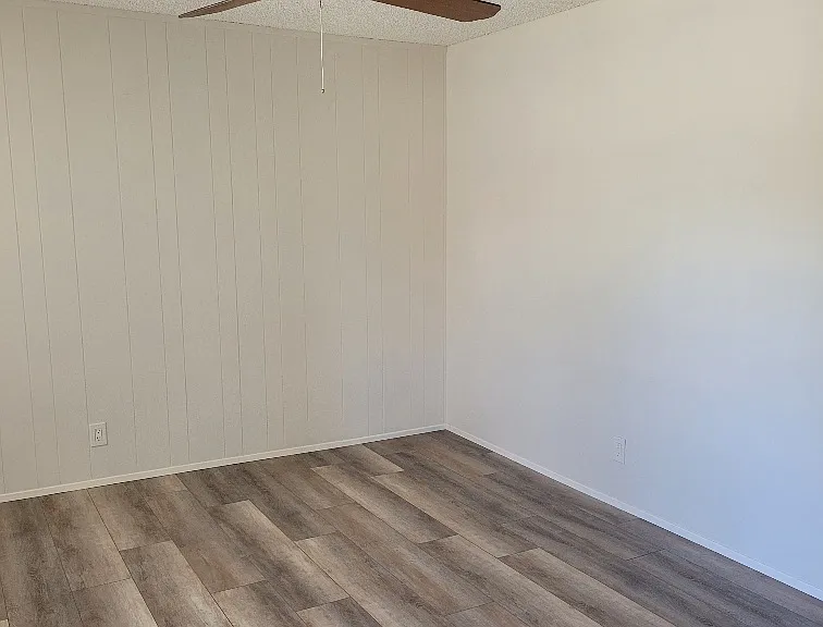 Living Room with new laminate flooring through