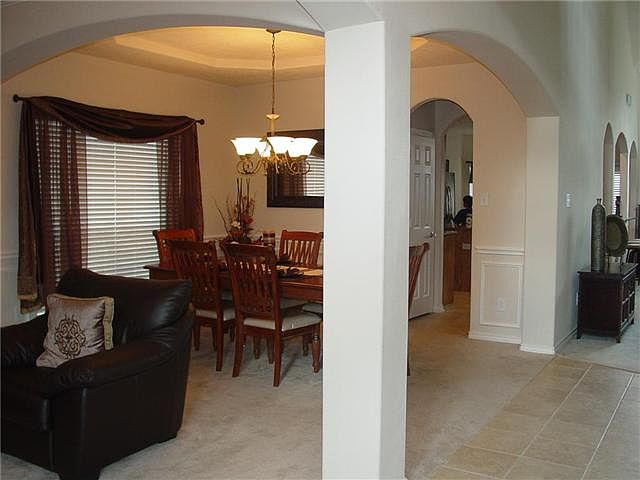 As you walk in front door, formal living & dining are to the