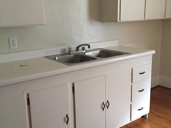 Bright kitchen with pantry and new gas stove
