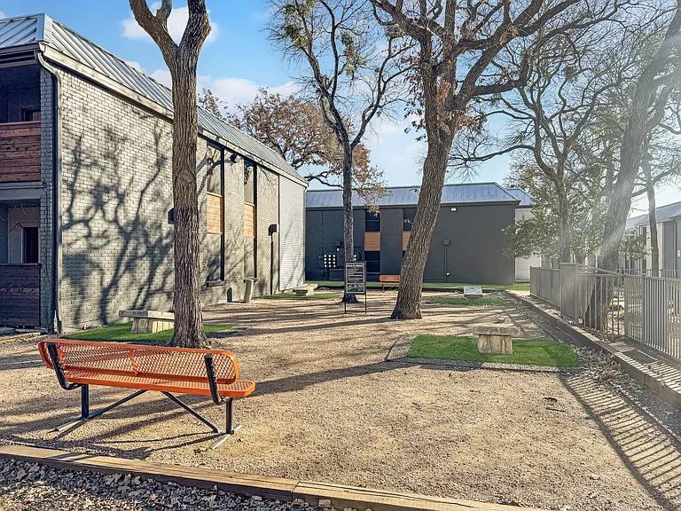 Enjoy the outdoors with shaded picnic areas surrounded by mature trees.