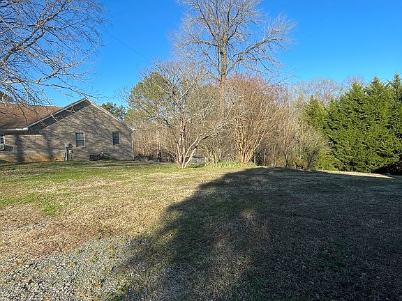 Side yard, looking out from the deck.