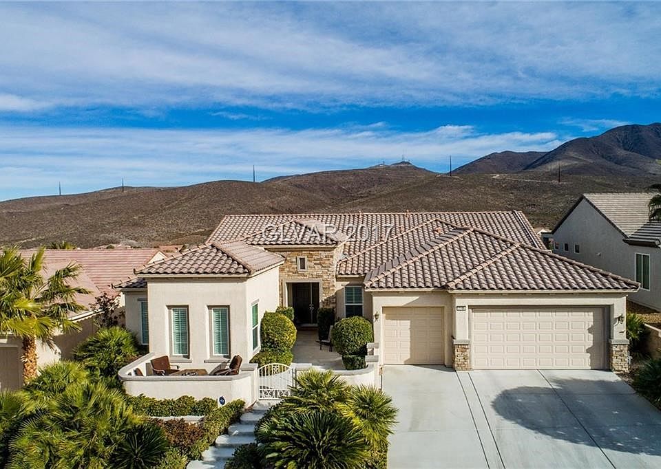 Beautifully upgraded "Charleston" model with great curb appeal! Sits on a elevated home site with no