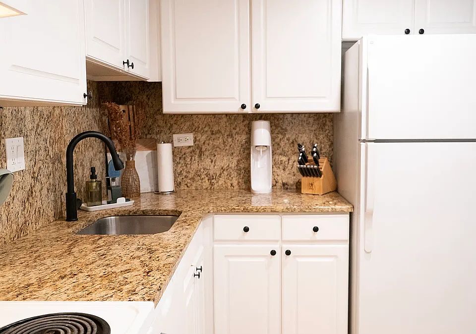Kitchen includes garbage disposal