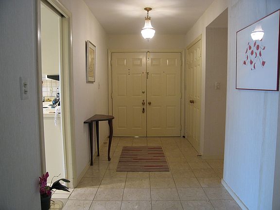 2nd image of 11400 Strand Dr APT 210