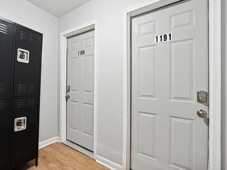 Doors in the duplex lobby. 1191 is the unit to enter.