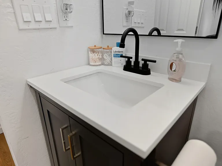 Walk-in closet shared with bathroom space