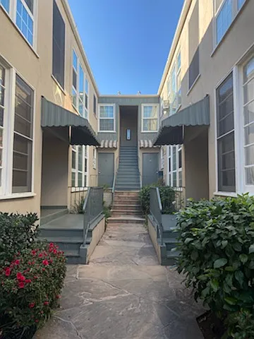 Courtyard of property with fully updated apt.!