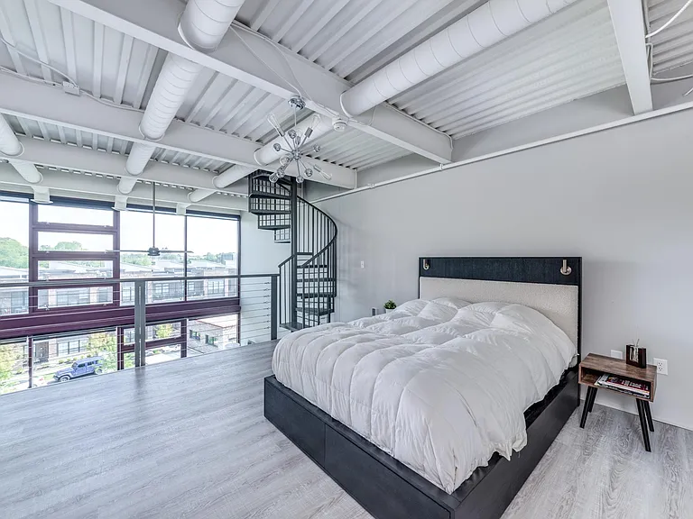 Sprial staircase to dedicated rooftop patio