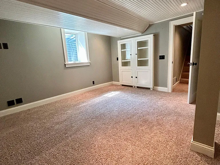 With the newly added egress window, this space is a spacious and legal bedroom.