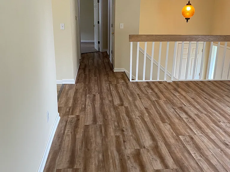 Living/family room with new LVP through out areas except bedrooms and kitchen and baths.