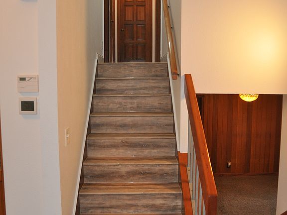 bedrooms and basement stairs