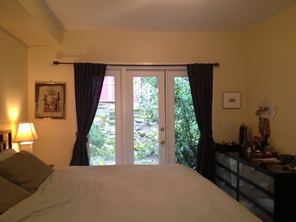 French doors from bedroom to backyard.