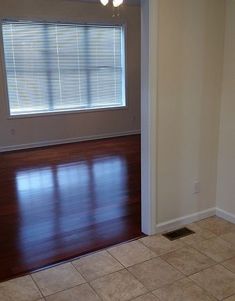 Living room looking frm kitc : Living and dining area are one large space. Kitchen leads into area.