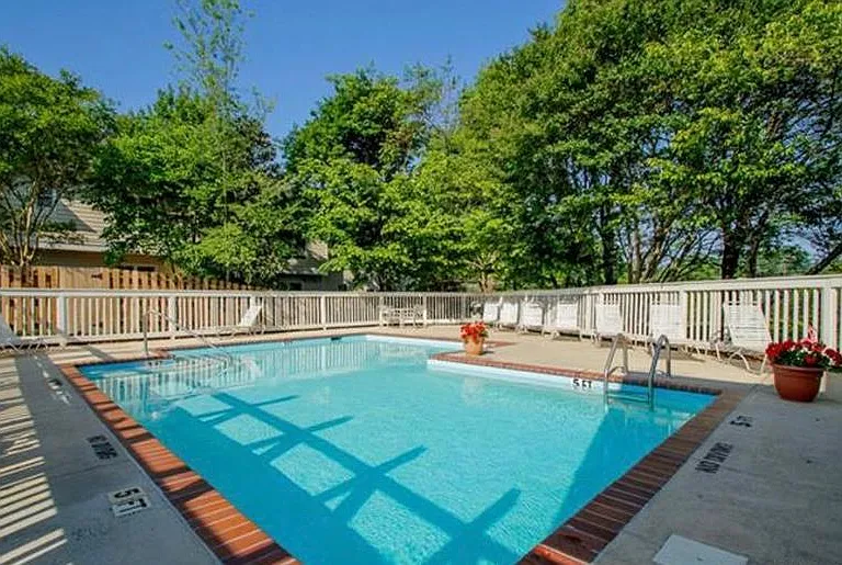 Community pool steps away, perfect for relaxing or meeting new friends
