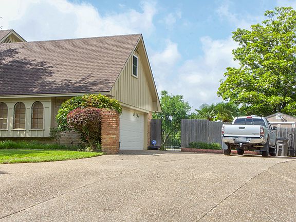Side of House and Garage
