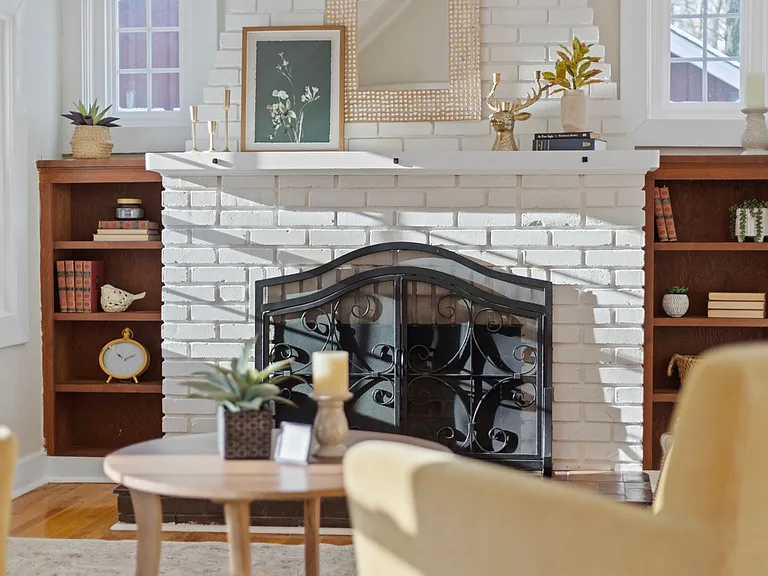 Formal living room. Fireplace is not available for use. Repairs can be negotiated if this is important.