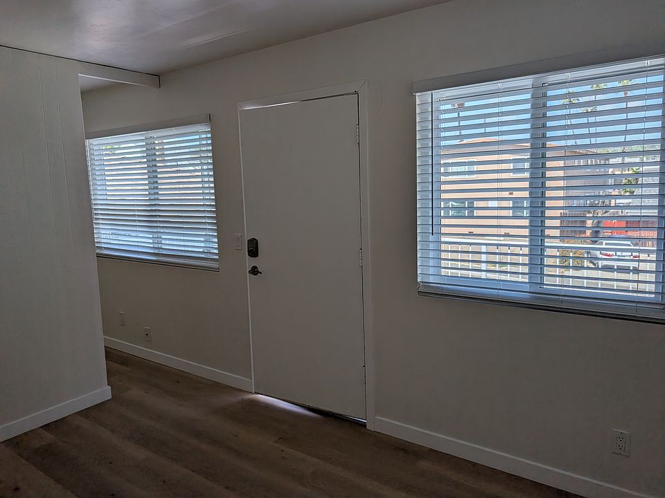 Two large windows - one in front of main area and one in front of sleeping area