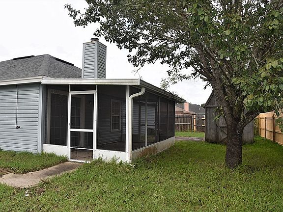 Screened patio and shed