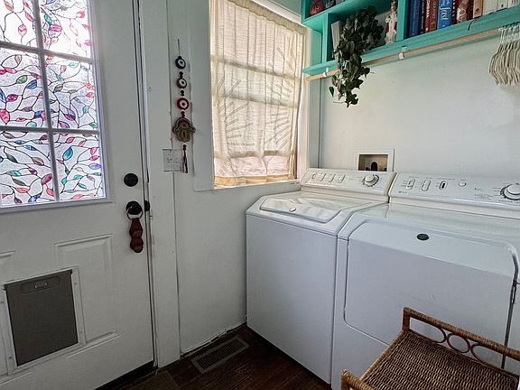 Laundry room also acts as a mudroom inside the front door