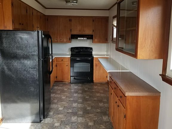 Spacious kitchen with food bar.