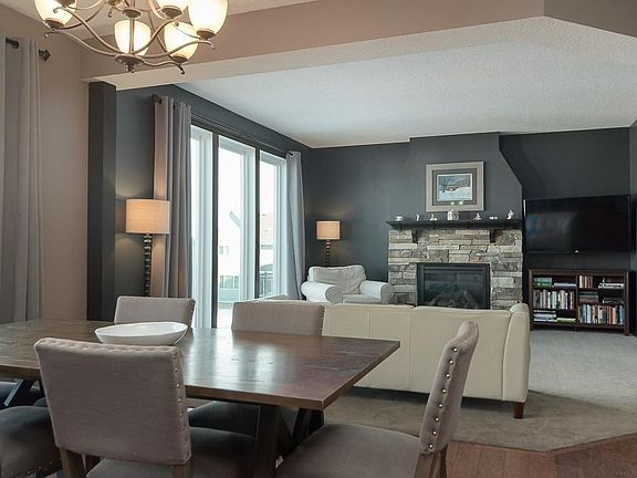 Open living/dining space with beautiful flooring!