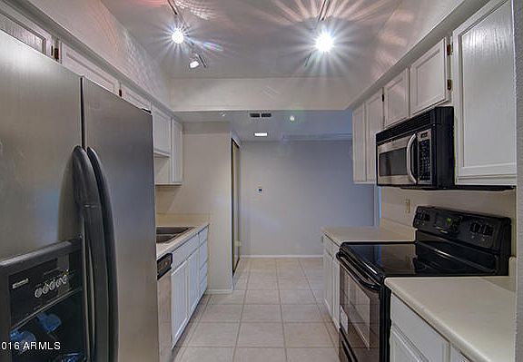 5th image of 9445 N 94th Pl Unit 202