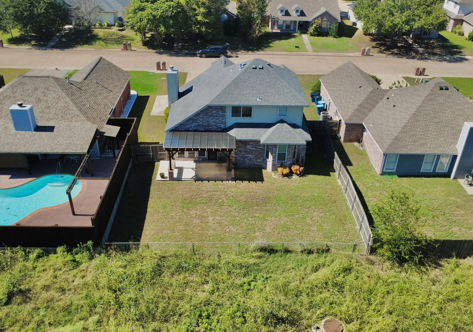 Special: $1,200 off First Month Rent! | Charming 3-Bed Home with Vaulted Ceilings, Big Backyard &... — Photo 2