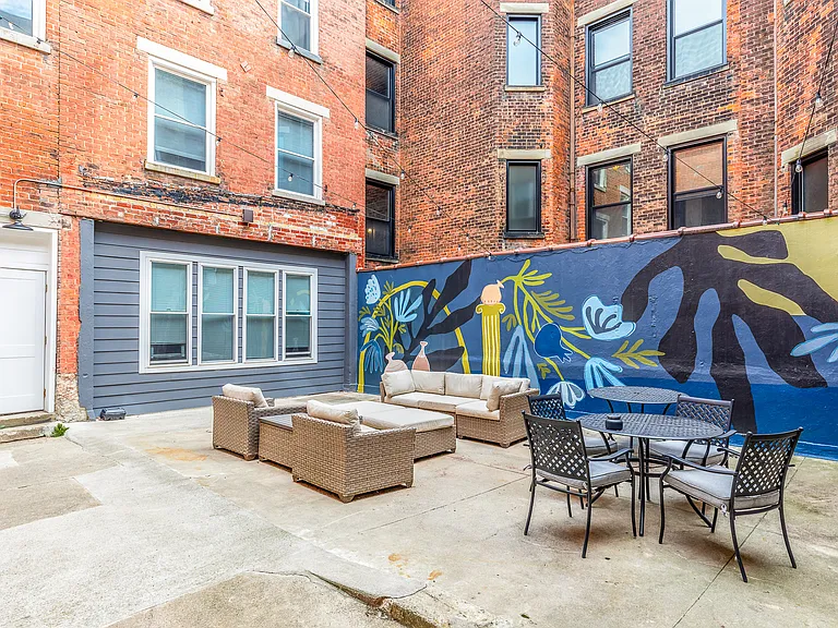 Courtyard is shared by building and all units lookout on to it. The building next door is now completed and owned by the same family.