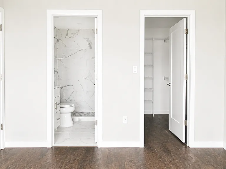 Master bedroom with en-suite bath and walk-in closet