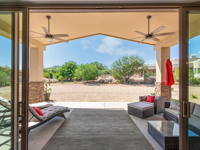 JUST OUTSIDE THE GREAT ROOM IS 16 FT SLIDING DOOR TO COVERED PATIO. COMMUNITY HAS OLYMPIC SIZE HEATED POOL AND SPA, FITNESS CENTER, 18 HOLE PUTPUT AND READ ABOUT THE GOLF COURSE.
