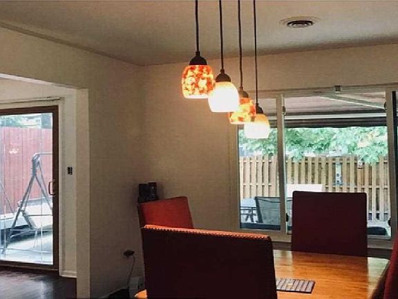 Dining room with deck outside.