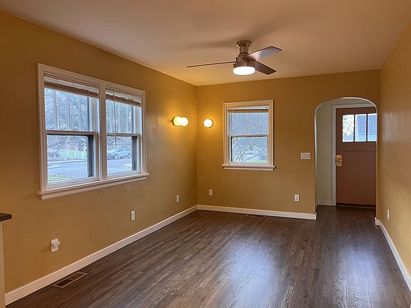 Living Room. Re-finished hardwood floors throughout main level.