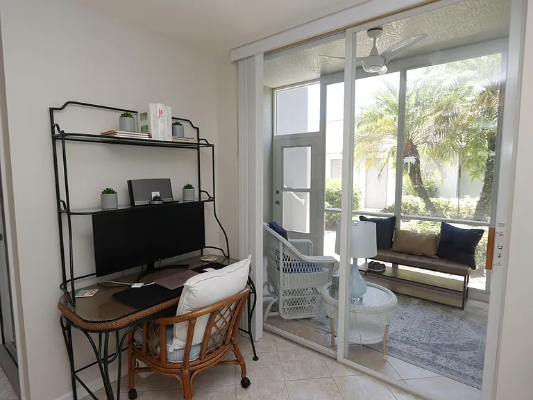 Working remotely is a breeze w/this workstation and monitor just off the kitchen and front veranda