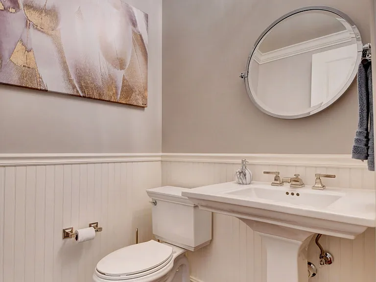 Half Bath located between living room and Kitchen 2nd floor