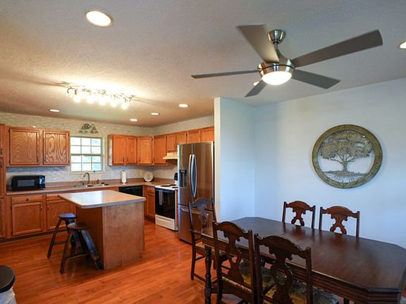 Dining room with table into kitchen