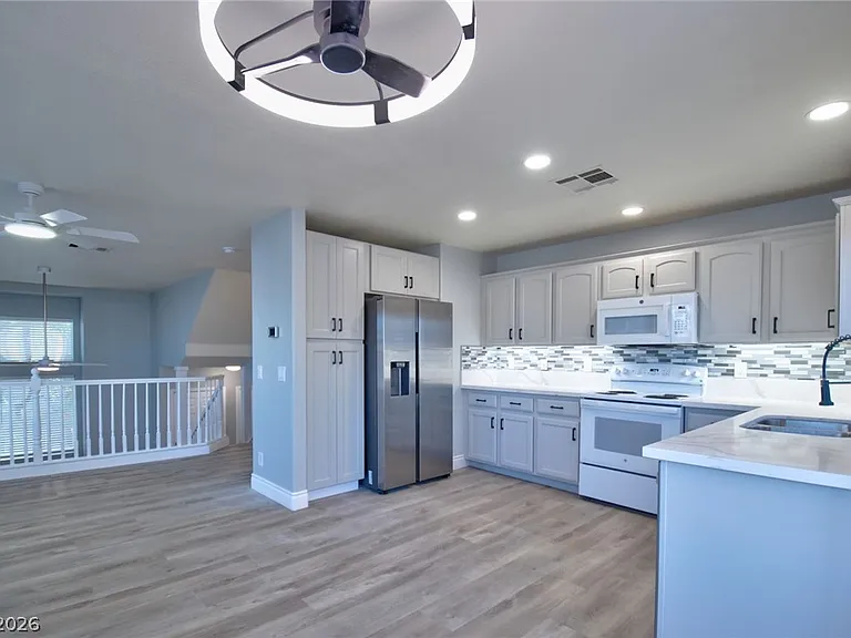 8401 Tiger Woods Ave — Photo 11