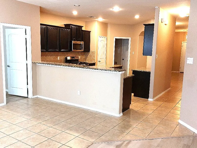 Open layout with Living Room, Breakfast Nook & Kitchen. Great space for family & entertaining friends.