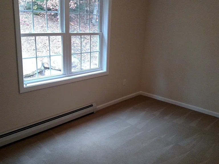 second bedroom. now has updated flooring. no longer has carpets