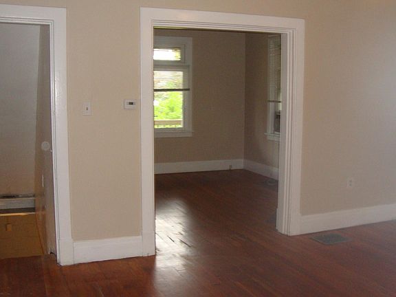Dining and living rooms, and stairs to basement